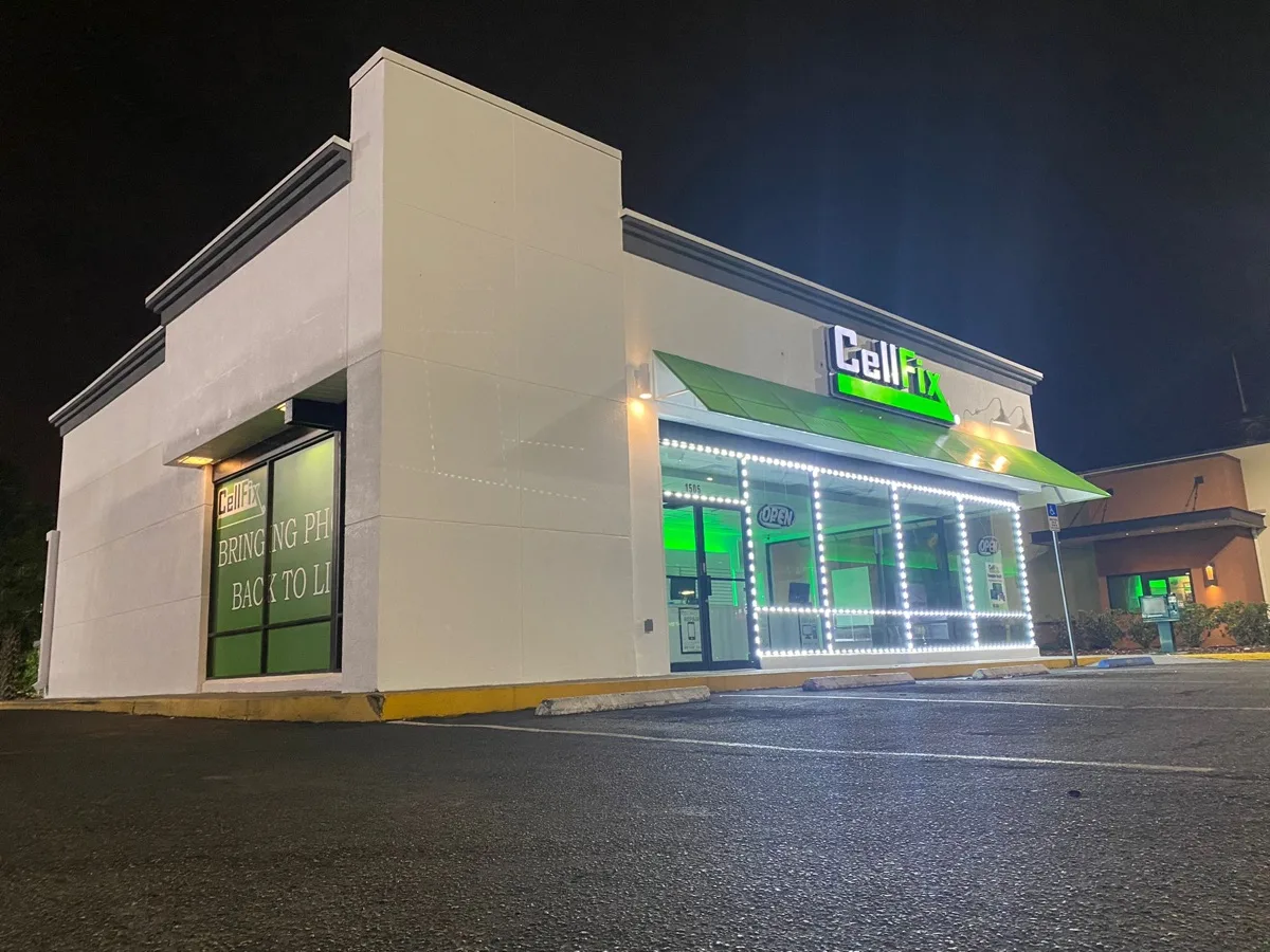 CellFix Fowler Ave storefront at night, 1505 E Fowler Ave, Tampa